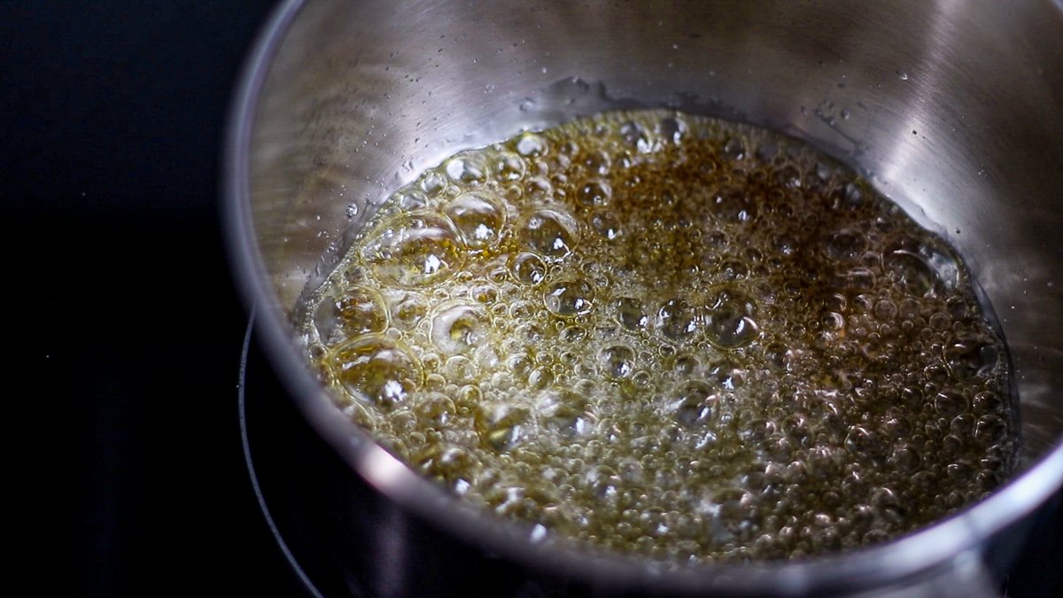 Place granulated sugar in a saucepan and heat over medium heat.