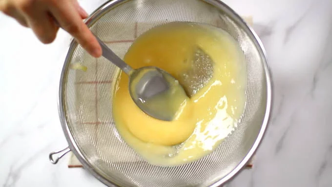 Strain the cream through a strainer and transfer to a pourable container