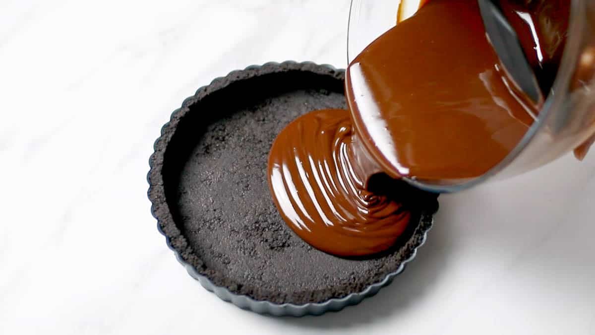 Slowly mix until smooth and creamy.

Pour the mixture into the tart pan and refrigerate for 3 hours to overnight.