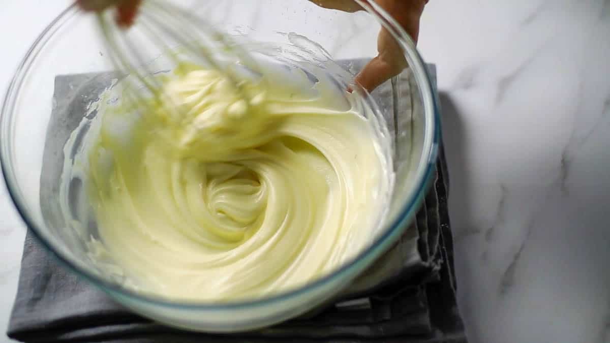 Add cream cheese and mix until combined (If the mixture seems a little soft at this point, put it in the refrigerator)