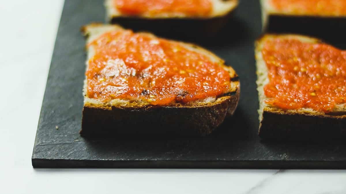 Top the bread with the tomatoes and it is ready to serve